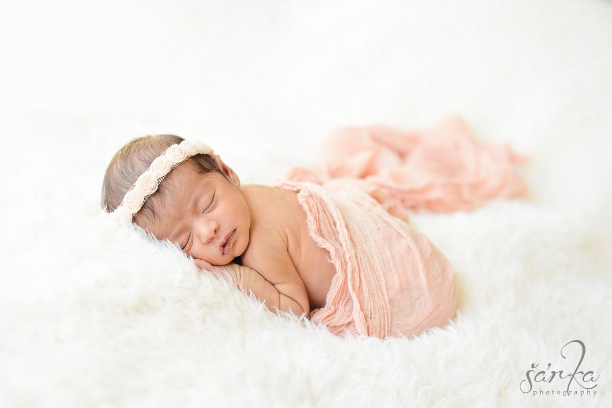 newborn baby girl sleeping on a white blanket photographed by San Francisco Bay Are baby photographer Sarka Photography
