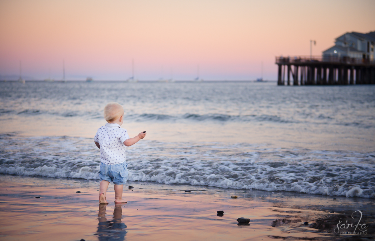 toddler boy walking on the beach at sunset photographed by Santa Barbara baby photographer Sarka Photography