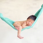 newborn baby boy sleeping in a hammock photographed by San Francisco Bay Area and Santa Barbara baby photographer Sarka Photography