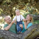 young boy with his parents in a tree photographed by Santa Barbara and San Francisco Bay area photographer Sarka Photography