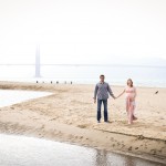 expecting couple at baker beach with golden gate bridge photographed by Santa Barbara and San Francisco Bay area photographer Sarka Photography