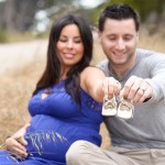 expecting couple holding baby shoes photographed by Santa Barbara and San Francisco Bay area photographer Sarka Photography