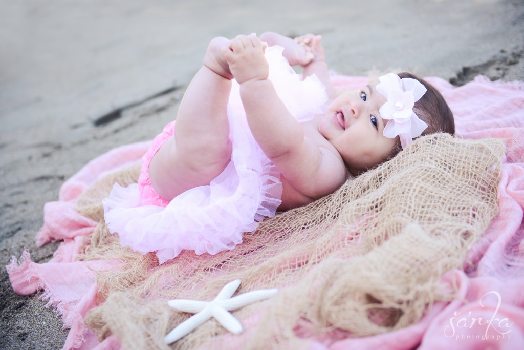 baby girl on the beach in San Francisco photographed by San Francisco Bay area baby photographer Sarka photography