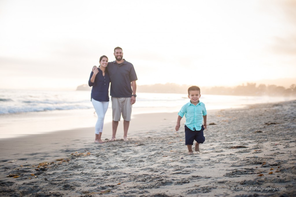 young family at sunset on the beach photographed by Santa Barbara children photographer Sarka Photography
