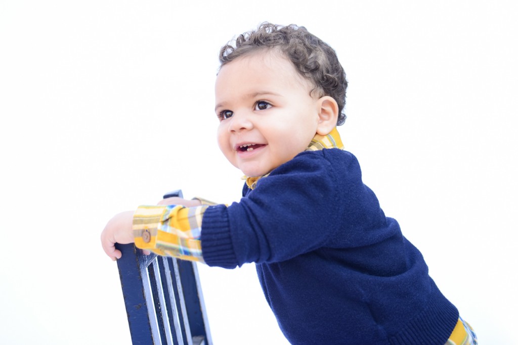 one year old baby boy smiling photographed by San Francisco Bay area baby photographer Sarka photography