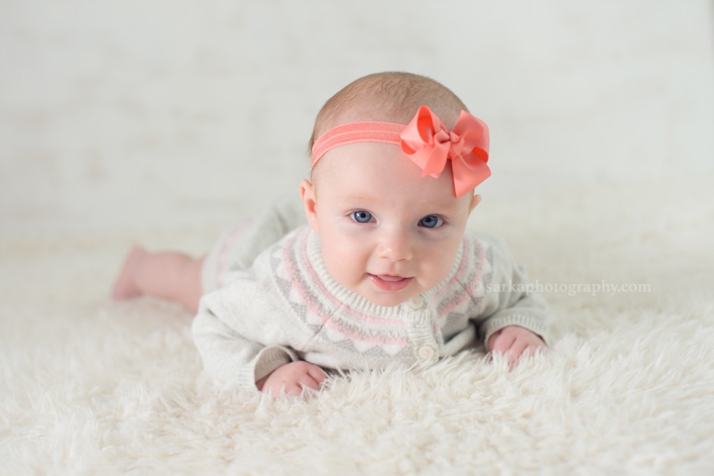 4month old baby girl wearing a winter sweater dress photographed by Santa Barbara and Bay Area Sarka photography