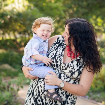 mom holding his toddler boy during their mom and me photo session in Santa Barbara by sarkaphotography