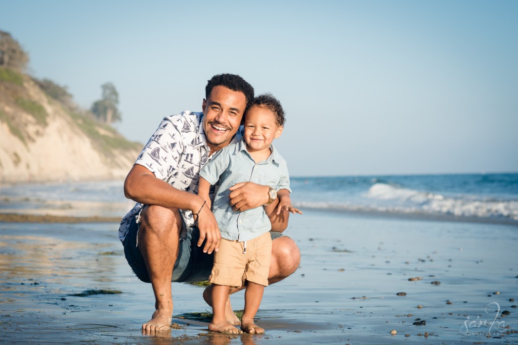 young dad with his son on the beach during a family photo session by santa barbara family photographer sarka