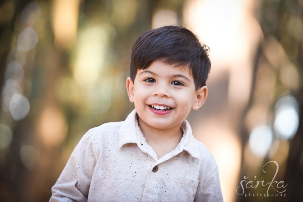 young boy smiling photographed by sarkaphotography in san francisco