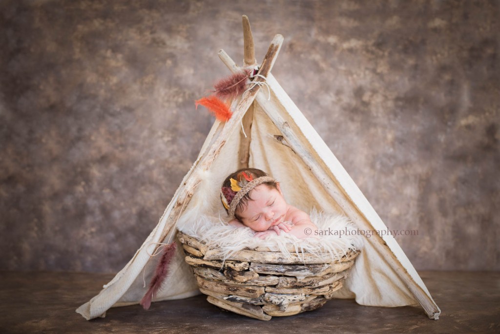 newborn baby boy sleeping in native tee-pee photographed by Santa Barbara Ojai baby photographer sarkaphotography