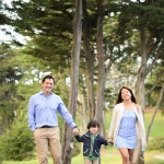 young family walking on a path in a park photographed by Santa Barbara and San Francisco Bay area photographer Sarka Photography