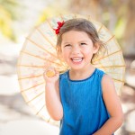 little girl holding umbrella photographed by Santa Barbara and San Francisco Bay area photographer Sarka Photography