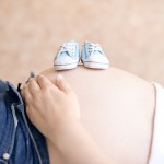 pregnant belly with baby shoes photographed by Santa Barbara and San Francisco Bay area photographer Sarka Photography